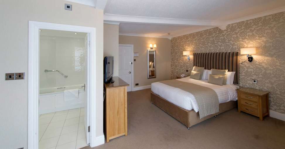 Royal and Fortescue Hotel Accommodation Bedroom with Door to Bathroom