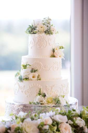 Large wedding cake decorated with roses