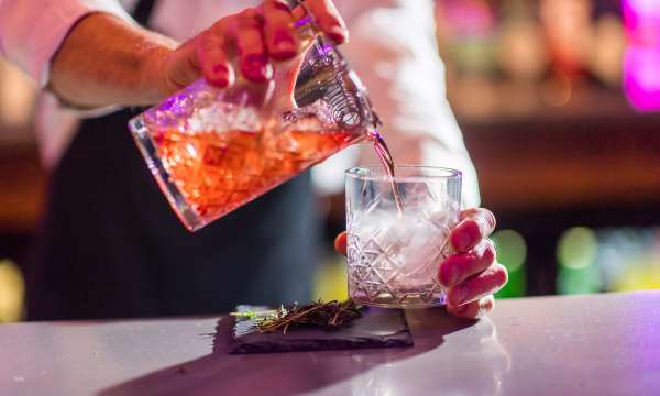 Royal and Fortescue Hotel Bar 62 Bartender Making Smoking Cocktail