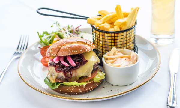 A signature beef burger with chips and salad at the Barnstaple Hotel