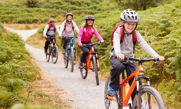 Group of 4 people cycling