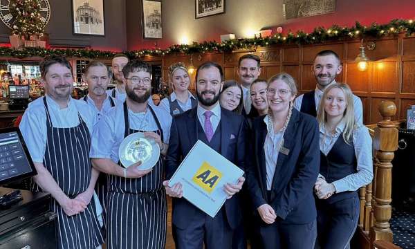 62 The bank team holding rosette