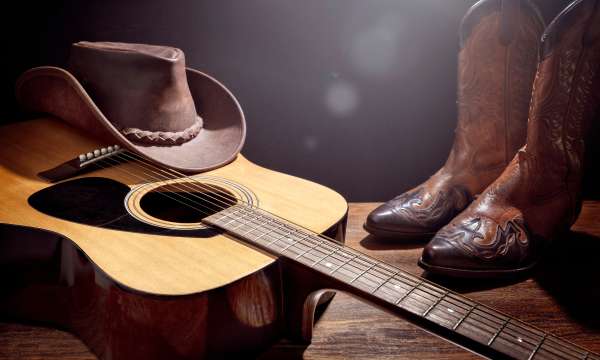 Guitar, cowboy boots and hat 