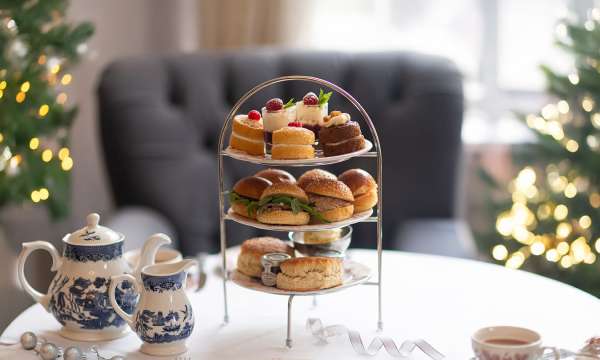 Festive Afternoon Tea with 2 Christmas trees in the background at The Royal & Fortescue Hotel 