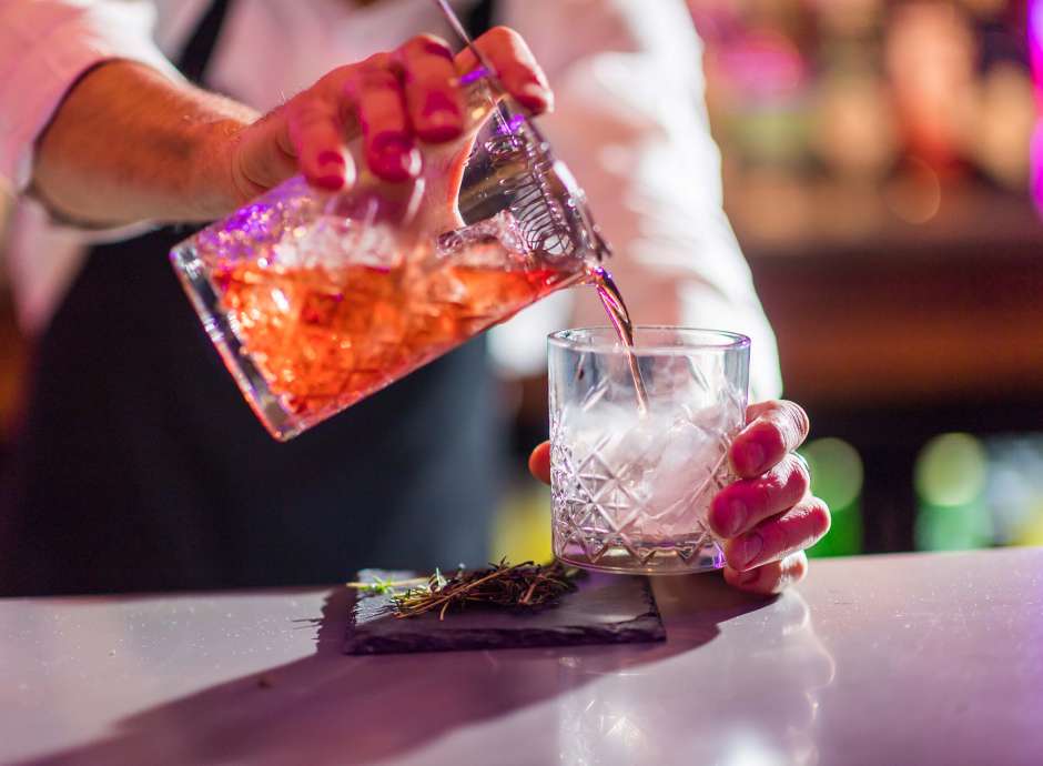 Royal and Fortescue Hotel Bar 62 Bartender Making Smoking Cocktail