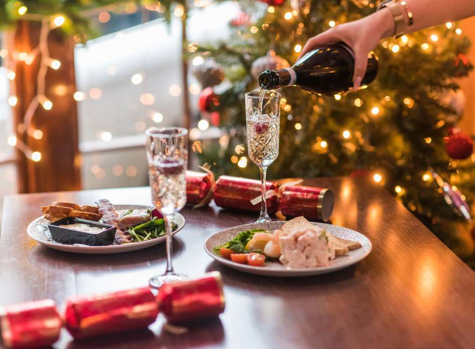 Royal and Fortescue Hotel 62 the Bank Restaurant Dining Christmas Food and Waitress Pouring Champagne