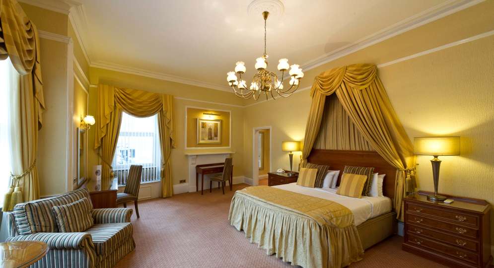 Royal and Fortescue Hotel Accommodation Bedroom with Seating Area and Desk