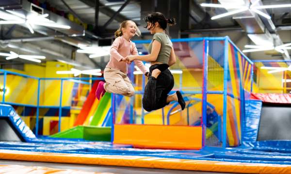 2 girls trampolining